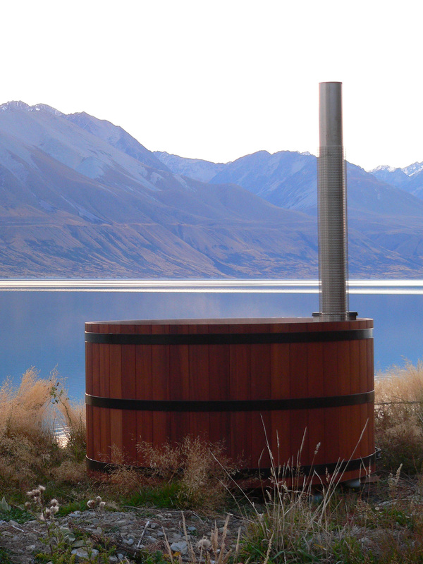 A Lignum Hot Tub in a stunning lake side scenery.